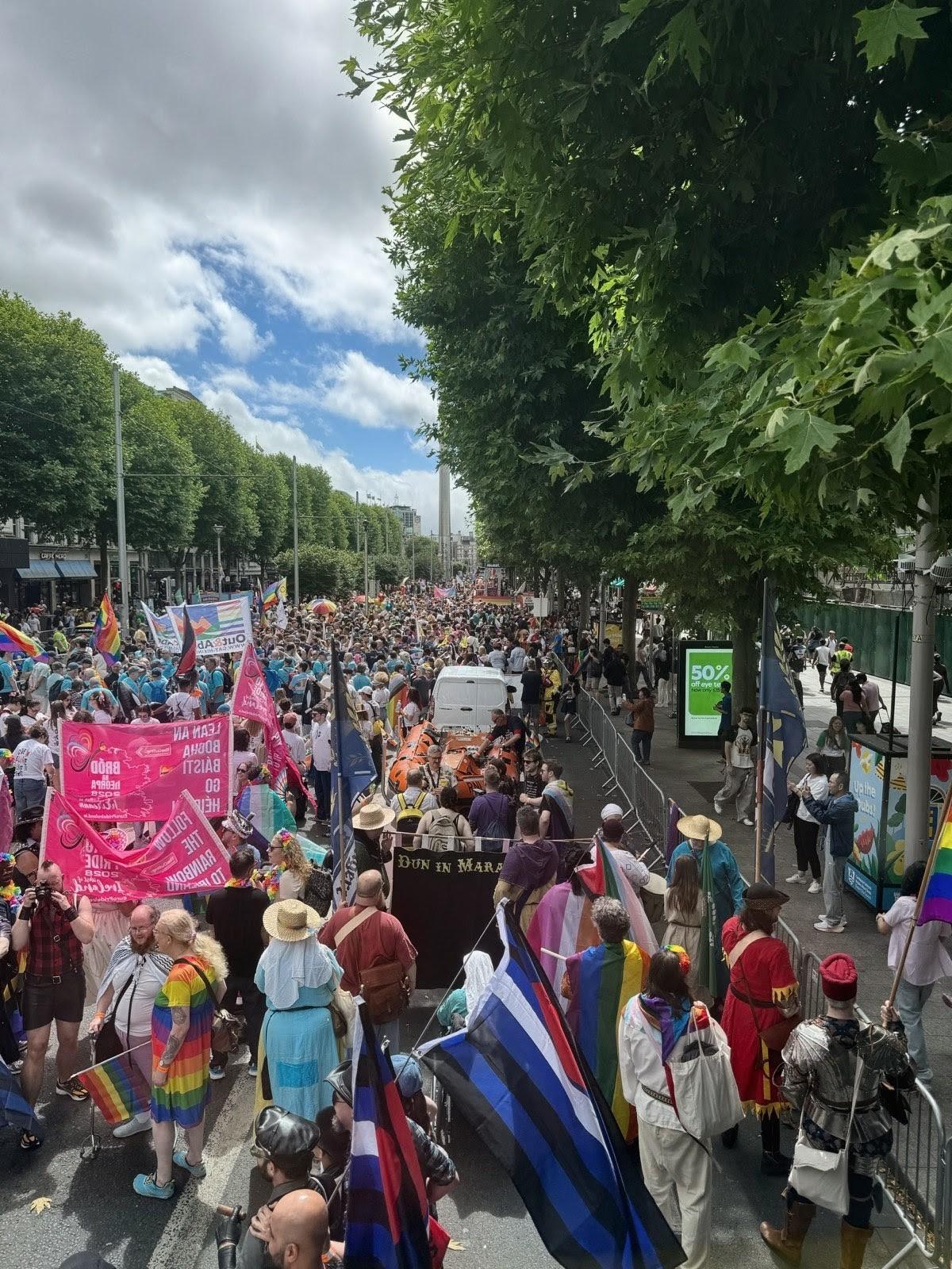 The crowd waiting to set off, as seen from the open top bus.